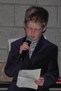 Clay Coughlin, 9, gave a speech at the National Trail Raceways Awards Banquet after being honored as the Jr. Dragster 1 champion.