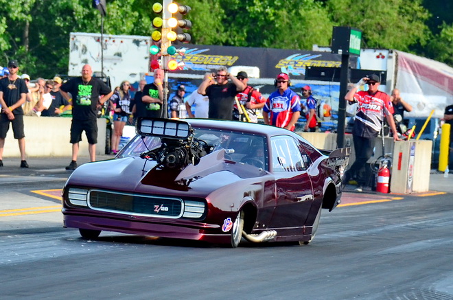 Scott Christoffel of Oswego, IL, gets a little out of shape off the launch of his blown 526-equipped '68 Camaro in the opening round of Pro Boost qualifying at the PDRA Summer Drags.