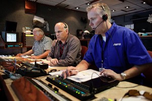 ESPN's NHRA producer Eric Swaringen (right) and director Bruce Watson (center) with the NHRA technical director (Photo courtesy ESPN Image)