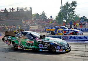 John Force (near lane) and Ron Capps