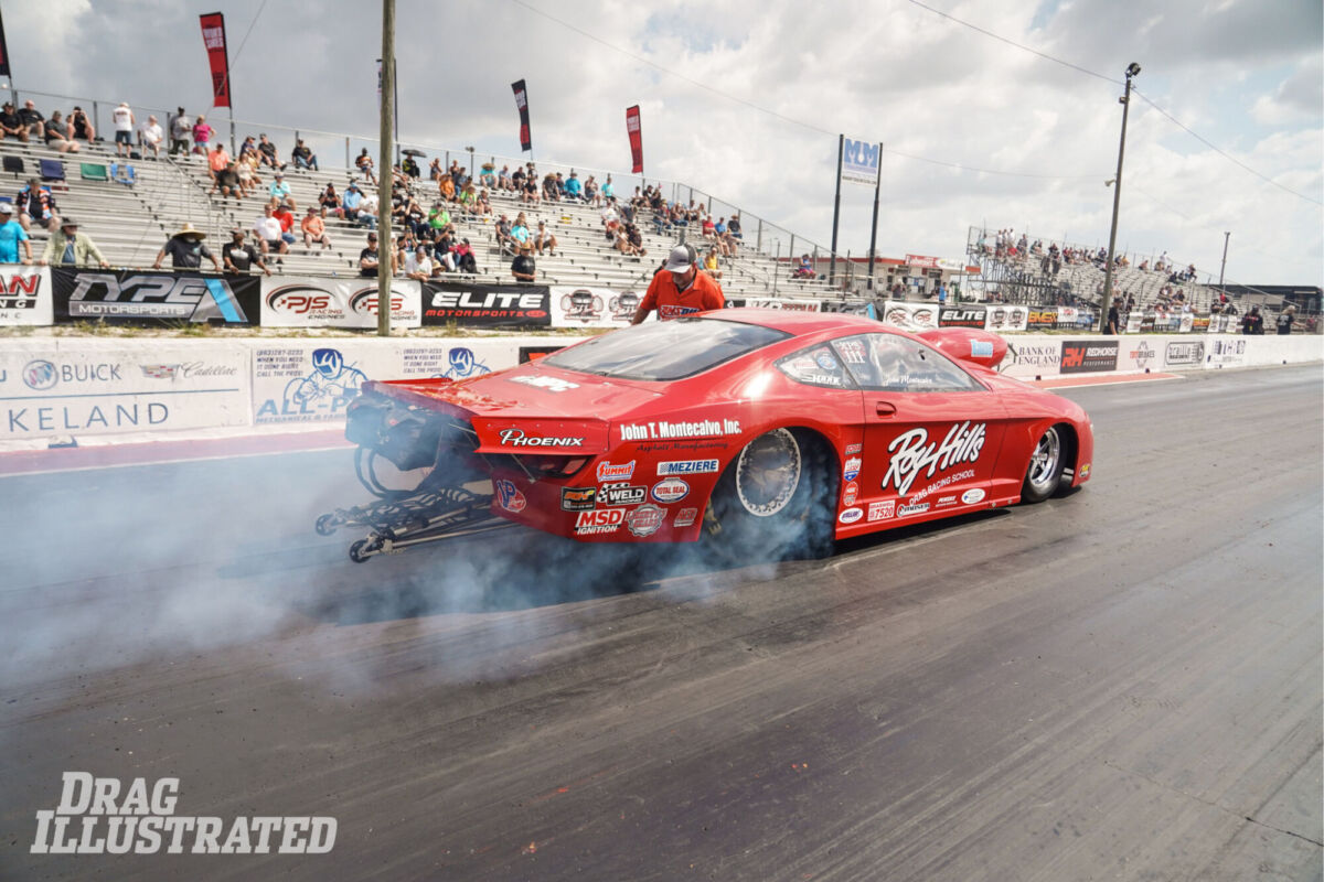 Two cars drifting battle on race track with smoke, Aerial view two car  drifting battle. — AB