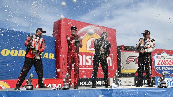 Top Fuel winner Shawn Langdon, Funny Car winner Jordan Vandergriff, Pro Stock winner Dallas Glenn, and Pro Stock Motorcycle winner Matt Smith celebrate in the winner's circle at the 2026 NHRA Southern Nationals.