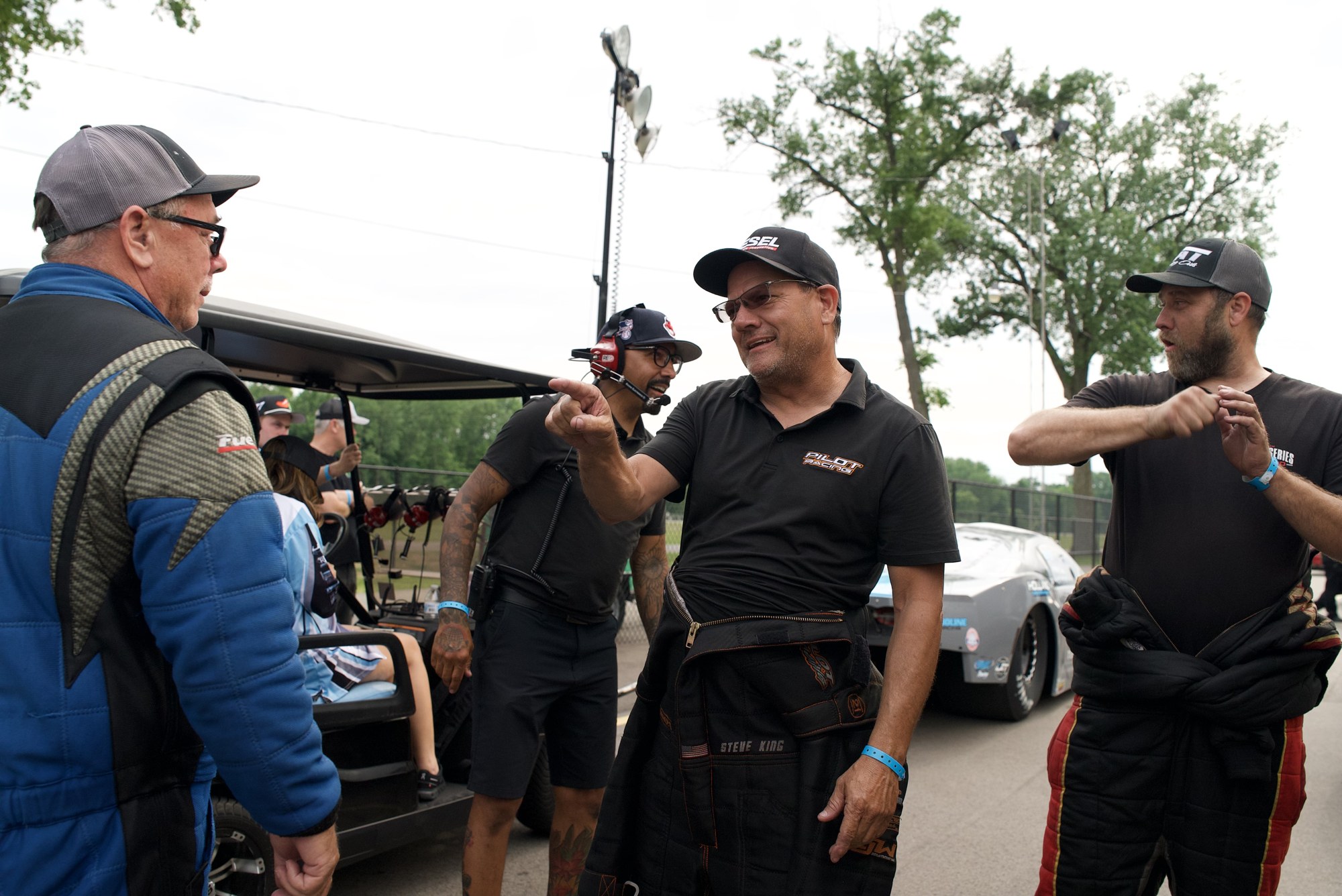 Steve King and Randy Weatherford in conversation in the pits at IHRA Pro Mod Mania.