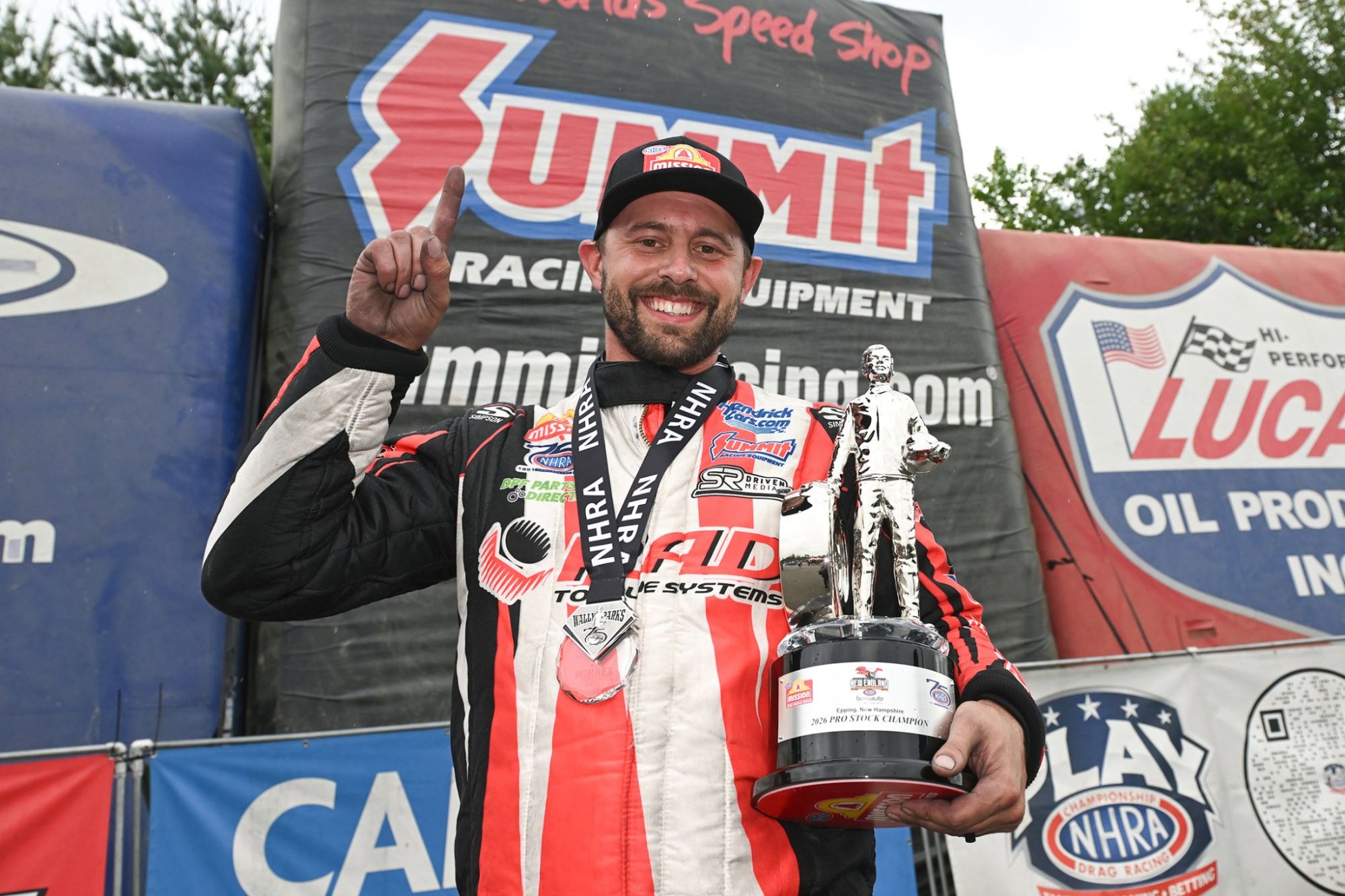 Dallas Glenn celebrates his Pro Stock victory at the NHRA New England Nationals.