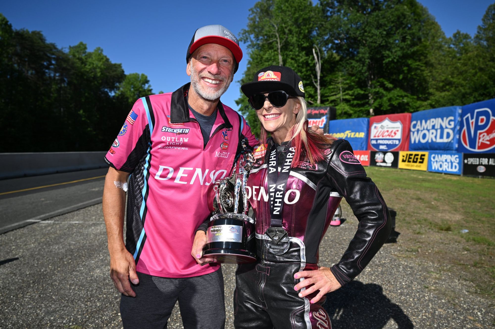 Angie Smith with husband and tuner Matt Smith after winning the 2026 inaugural NHRA Potomac Nationals - hours after Matt was hospitalized Friday morning.