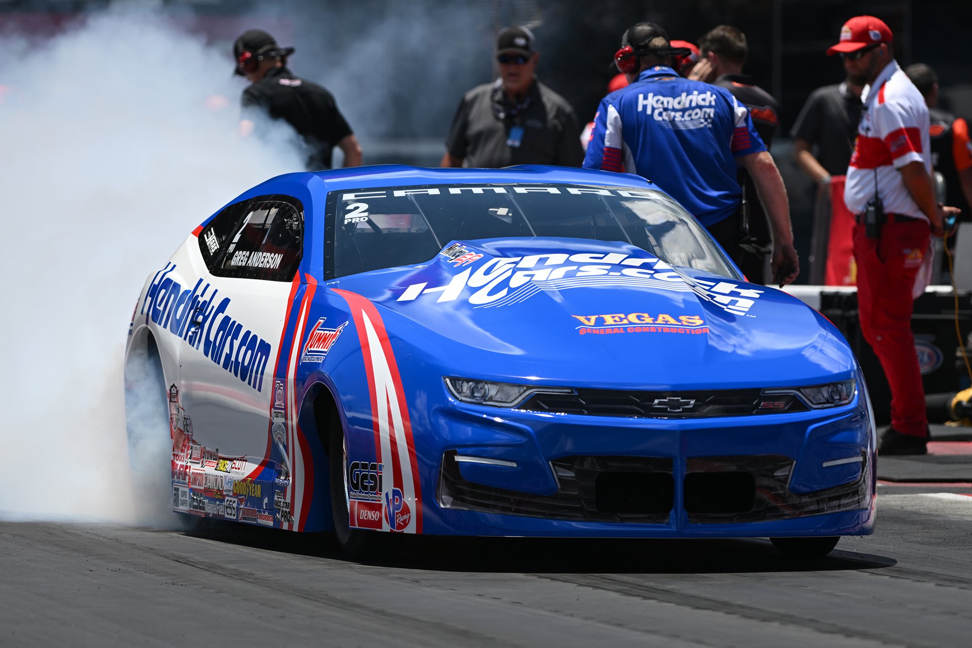 Greg Anderson burns out the HendrickCars.com Camaro at Bristol Dragway during Pro Stock qualifying for the 2026 Super Grip NHRA Thunder Valley Nationals.