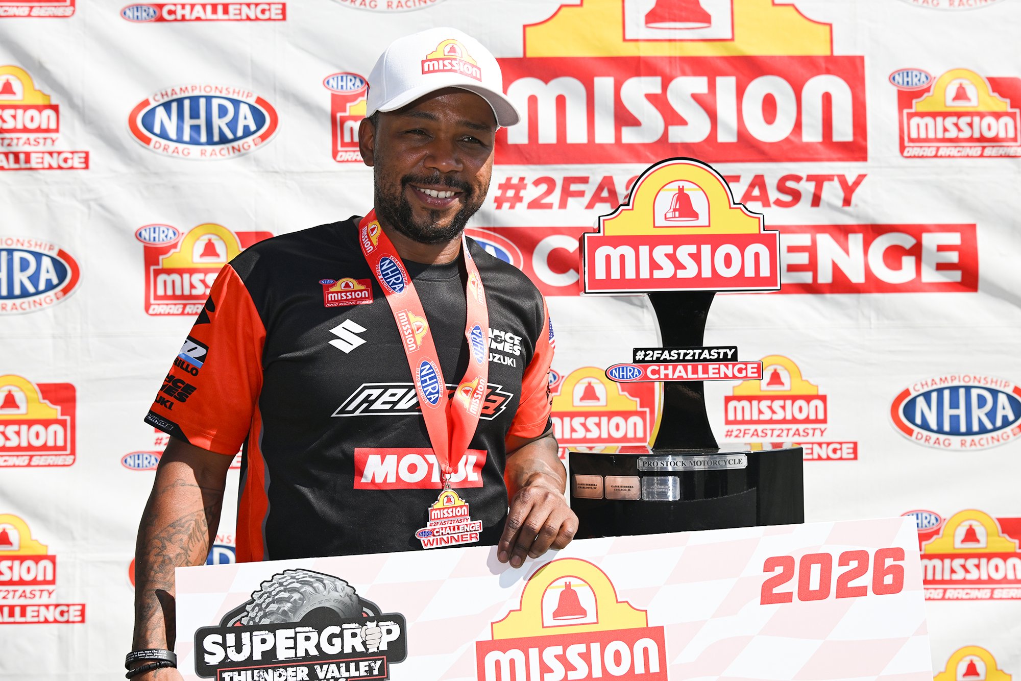 Richard Gadson with the Mission Foods #2Fast2Tasty Pro Stock Motorcycle trophy at the 2026 Super Grip NHRA Thunder Valley Nationals.