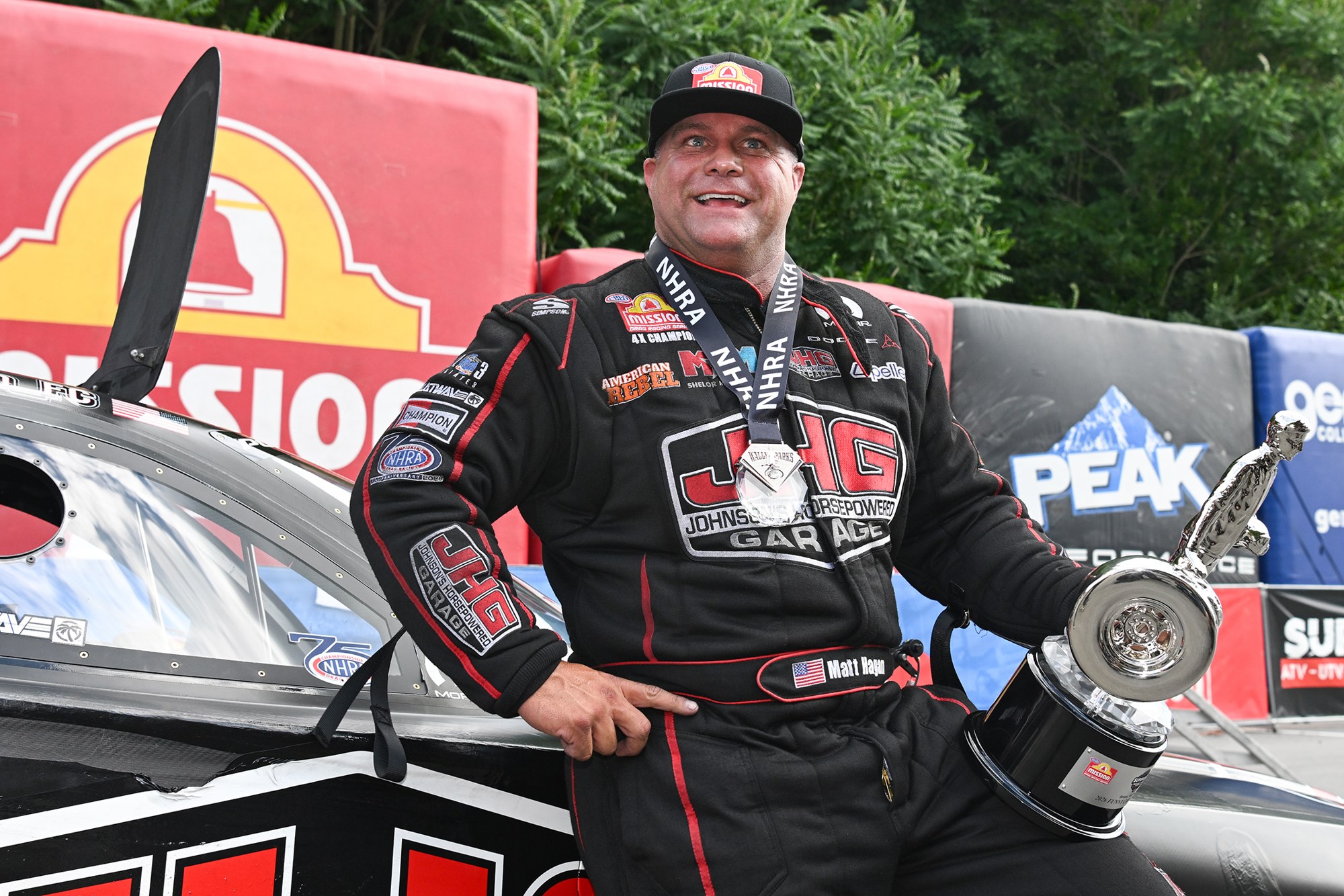 Matt Hagan with the Funny Car Wally at the 2026 Super Grip NHRA Thunder Valley Nationals at Bristol Dragway.