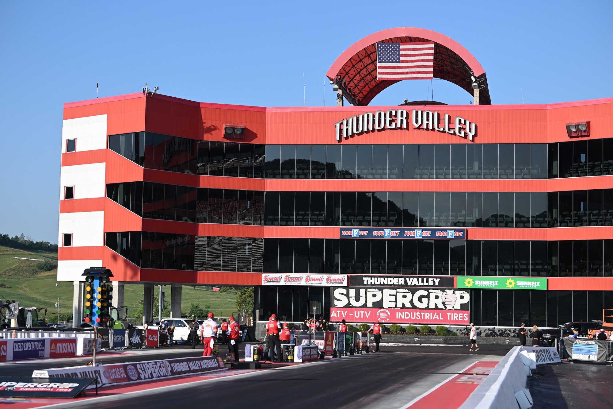 Bristol Dragway with SuperGrip NHRA Thunder Valley Nationals signage.