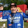 Greg Anderson, six-time Pro Stock world champion and 2026 points leader, celebrates with a Wally