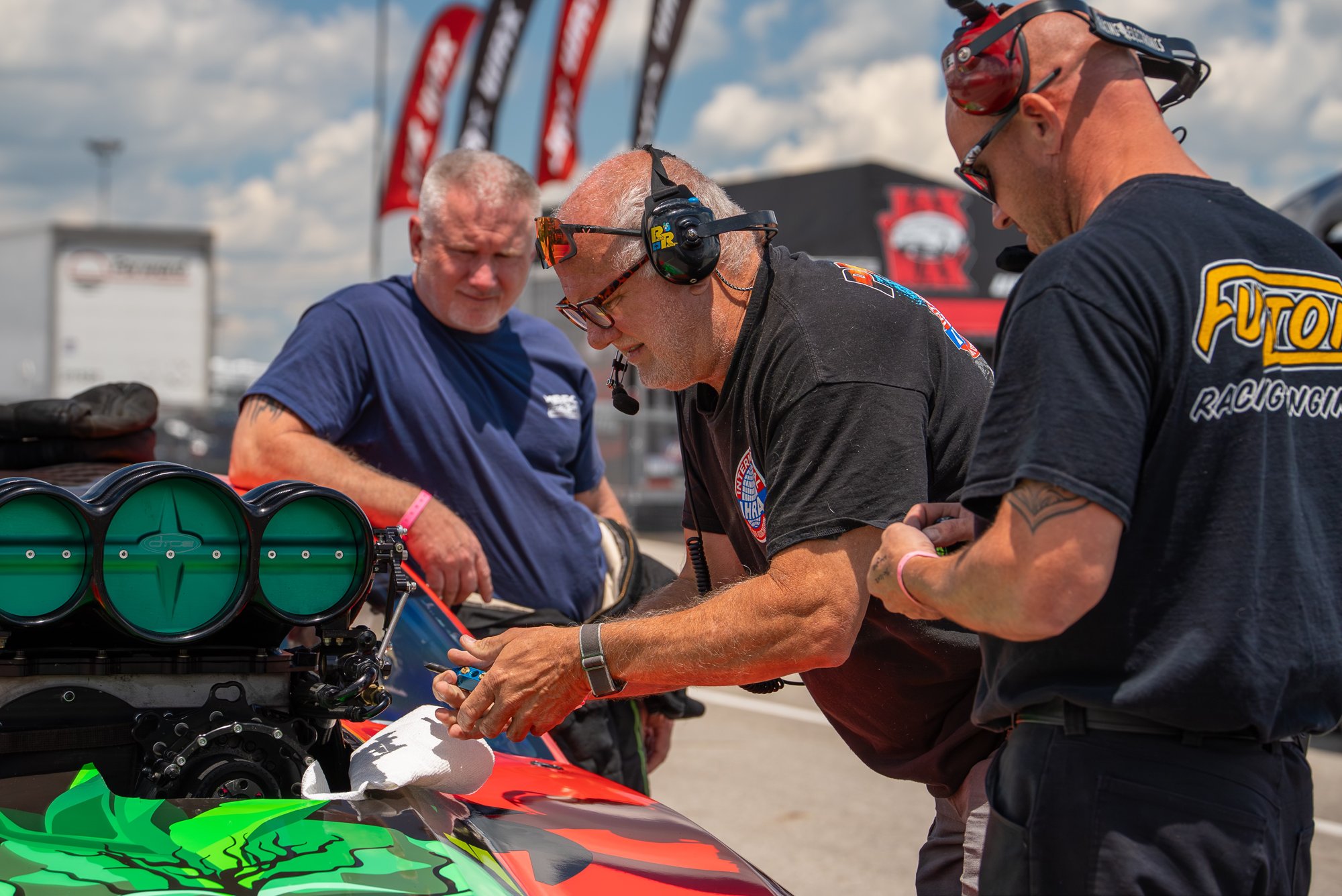Scotty Cannon making pre-run changes to Bubba Greene's Pro Mod - 2026 IHRA Triple Crown at Darana Raceway, photo by Jess Milante.
