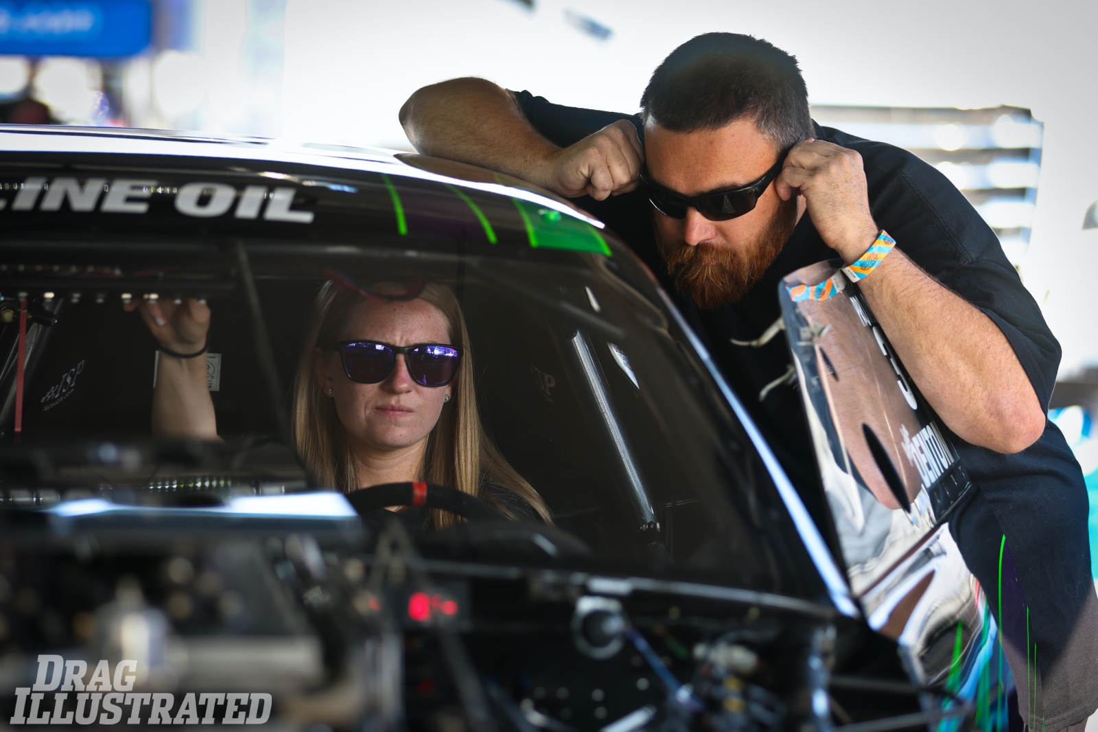 Amber Denton in her Red Line Oil Pro Nitrous car with Pierce at Maryland International Raceway