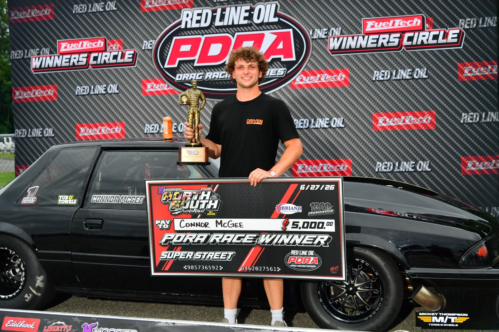 Connor McGee in the PDRA winner's circle with the Super Street trophy