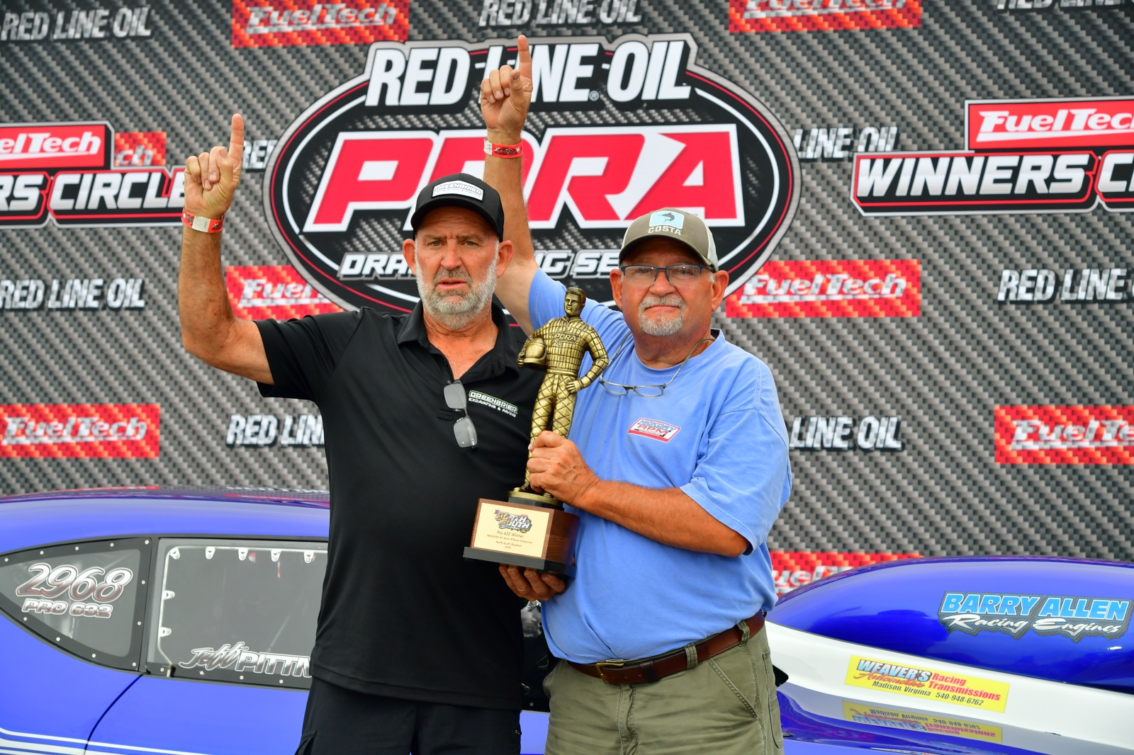 Jeff Pittman and car owner Alan O'Brien in the PDRA winner's circle with the Pro 632 trophy