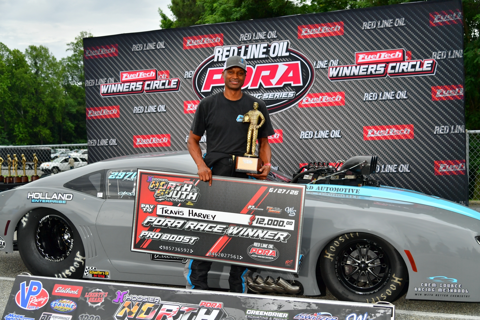 Travis Harvey in the PDRA winner's circle after his Pro Boost win at the 2026 North vs. South Shootout
