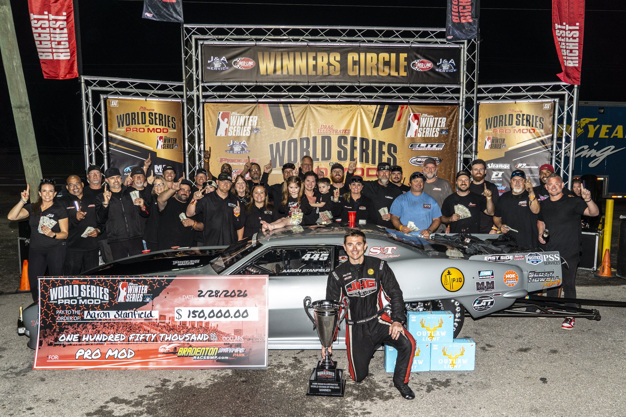 Aaron Stanfield and the Scott Tidwell Racing crew celebrate.