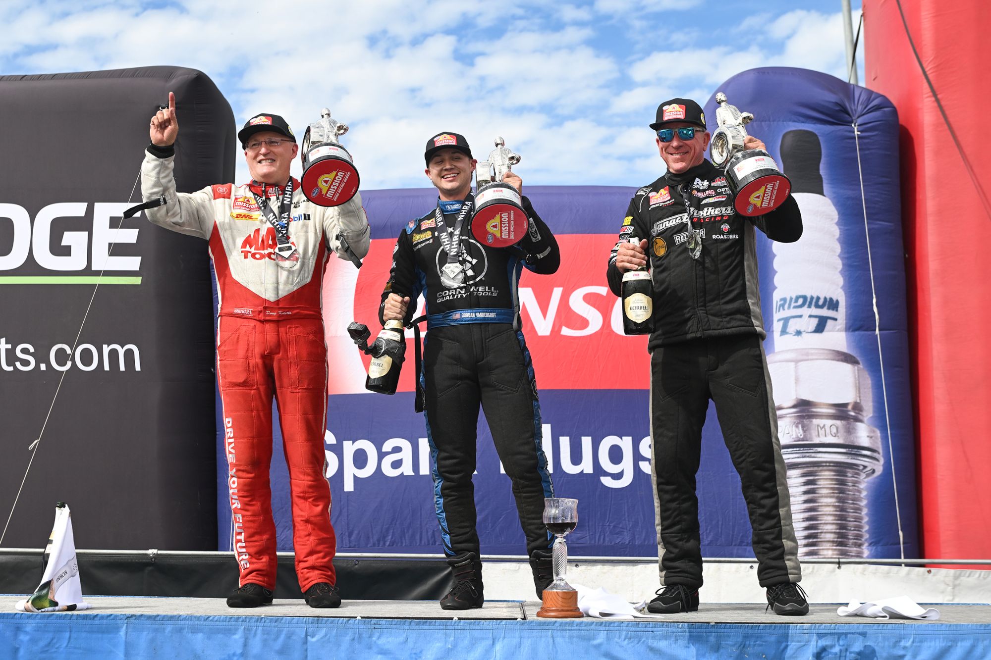 Doug Kalitta, Jordan Vandergriff and Greg Stanfield on the winners podium at the 2026 DENSO NHRA Sonoma Nationals