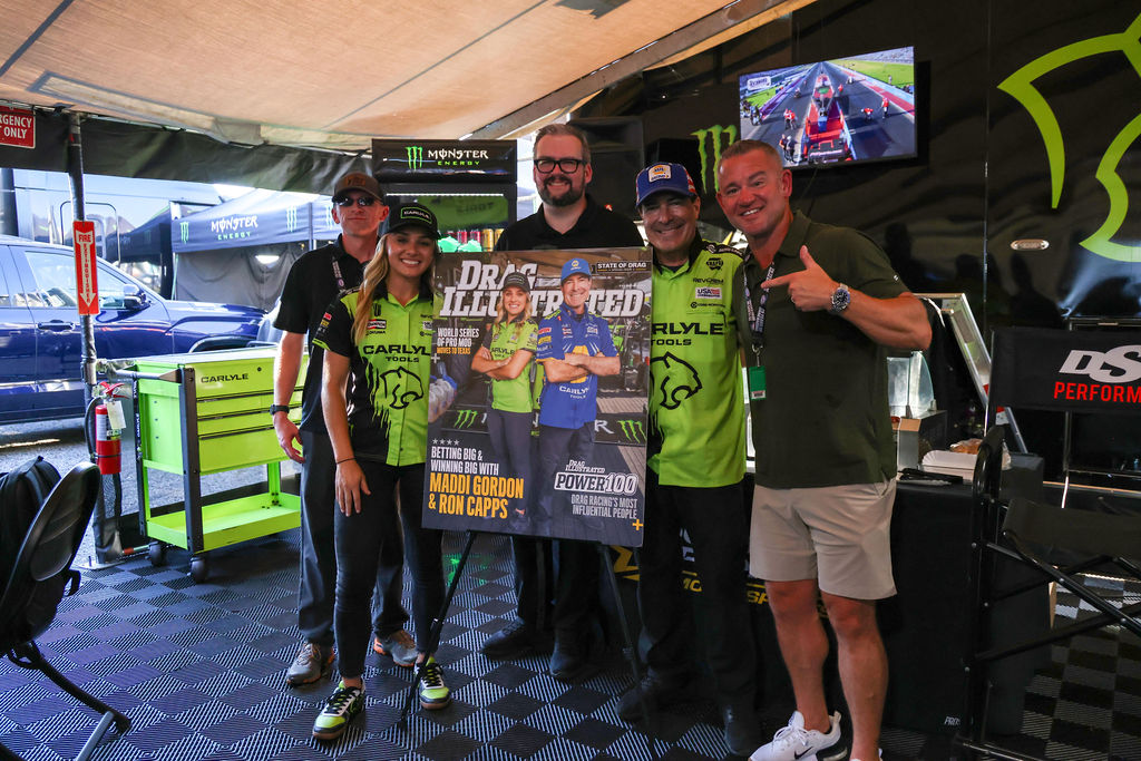 Drag Illustrated staff with Ron Capps and Maddi Gordon and the Power 100 cover at the 2026 NHRA U.S. Nationals