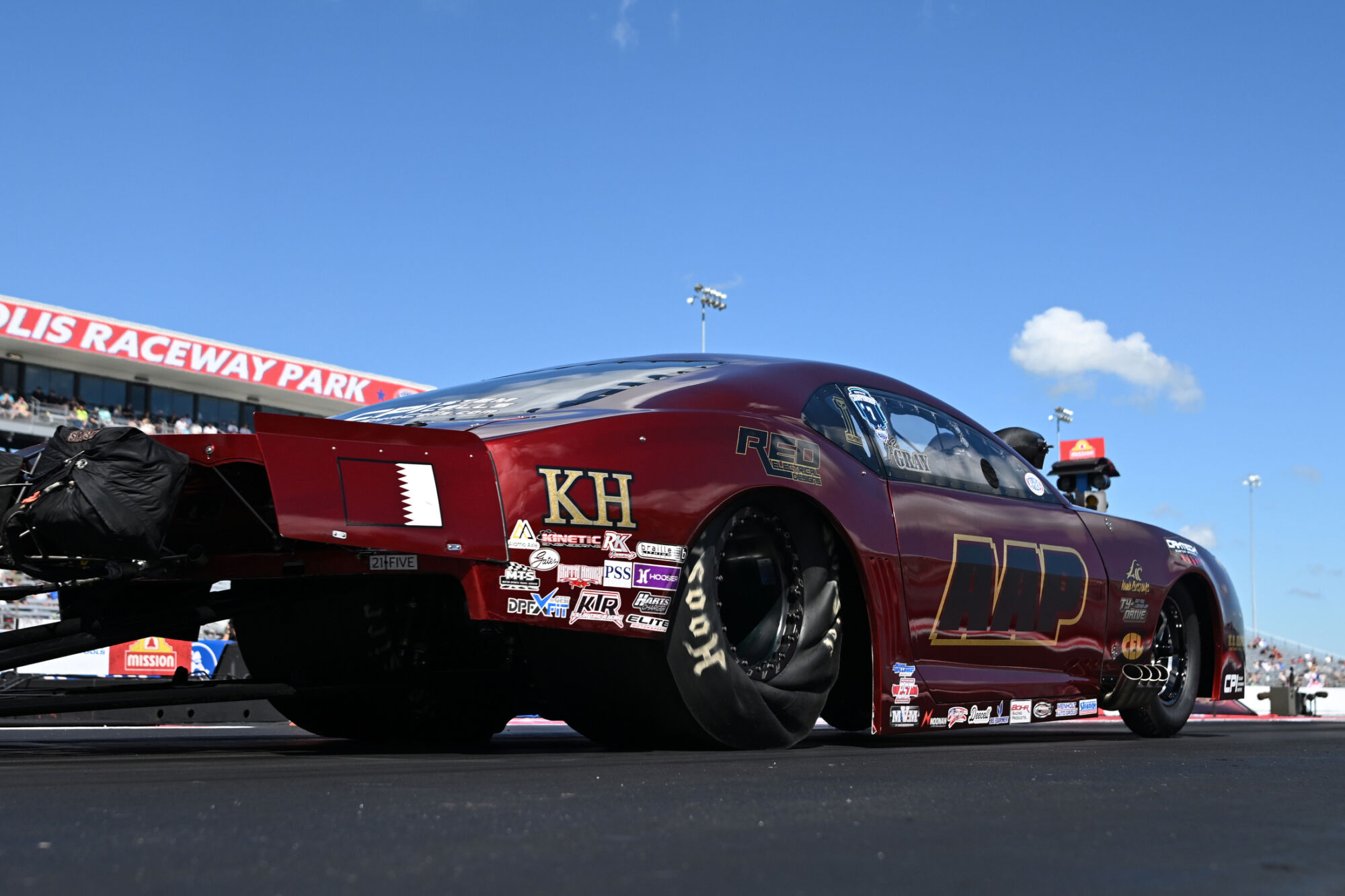 J.R. Gray stages the maroon and gold AAP Chevrolet Camaro Pro Mod at Lucas Oil Indianapolis Raceway Park