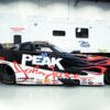 Jack Beckman PEAK Chevrolet SS Funny Car in John Force's flamed 1996 championship tribute livery