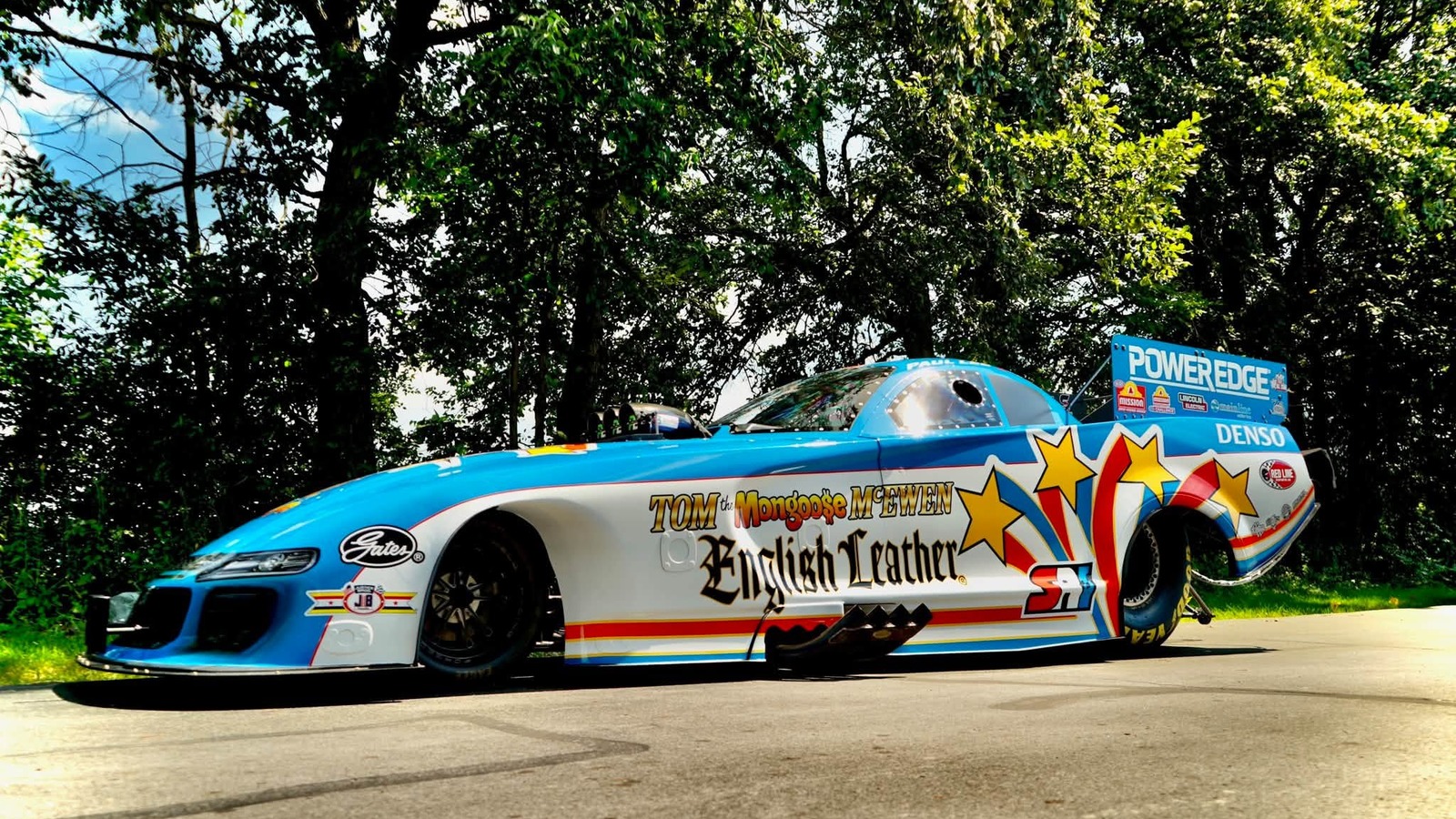 Paul Lee nitro Funny Car in the light blue Tom the Mongoose McEwen English Leather Bicentennial tribute livery