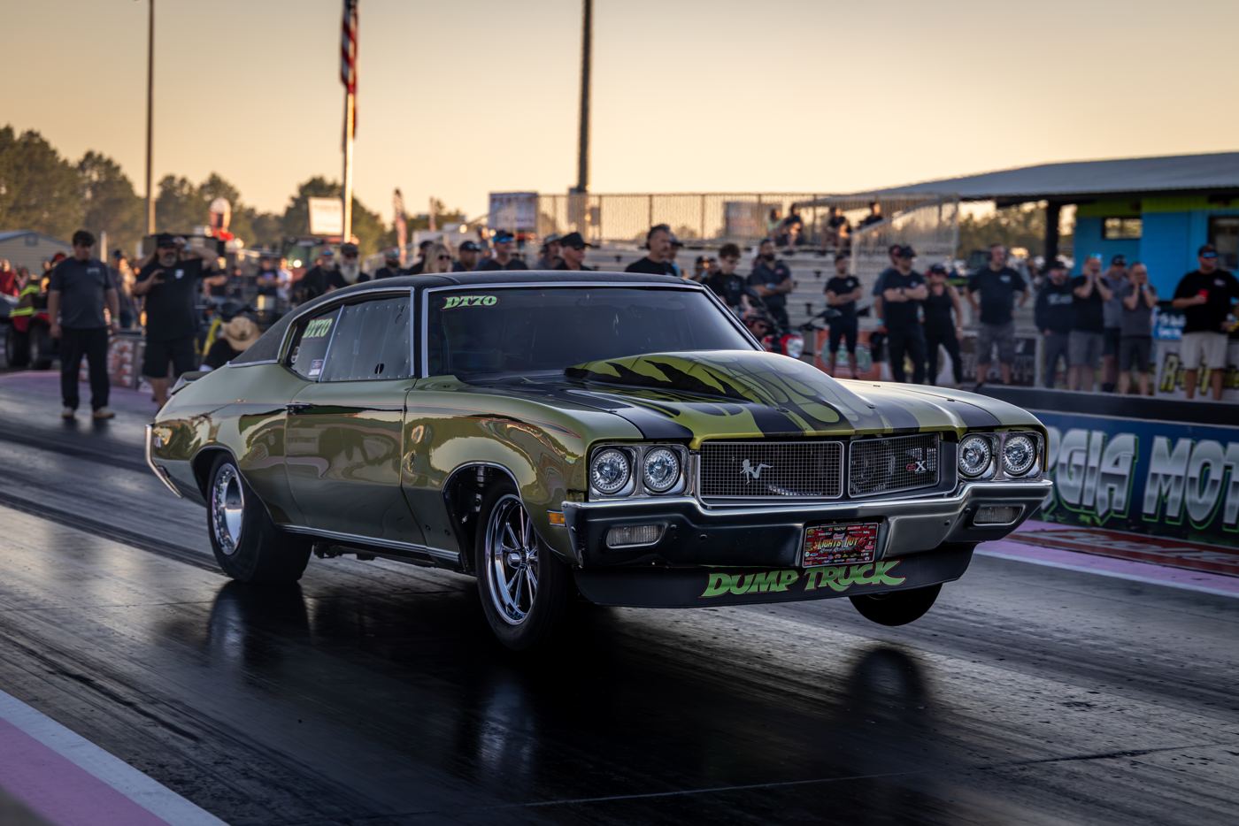 Gold Buick GS lettered Dump Truck stages at sunset at South Georgia Motorsports Park